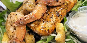 Salmon and shrimp Ceasar Salad